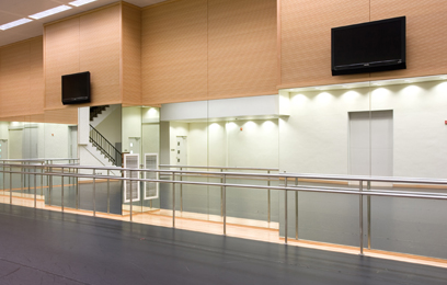 Function Room I with dance tiles, full length wall mirrors  and two monitors on wall